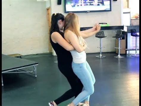 In the video, three women are seen dancing and removing their clothes while the crowd and the club's DJ yelled "Take it all off!". . Lesbian lap dancers